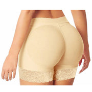 A woman wears high-waist beige padded shapewear for lift and tummy control.