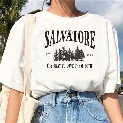 White vintage graphic t-shirt with "Salvatore" text design.